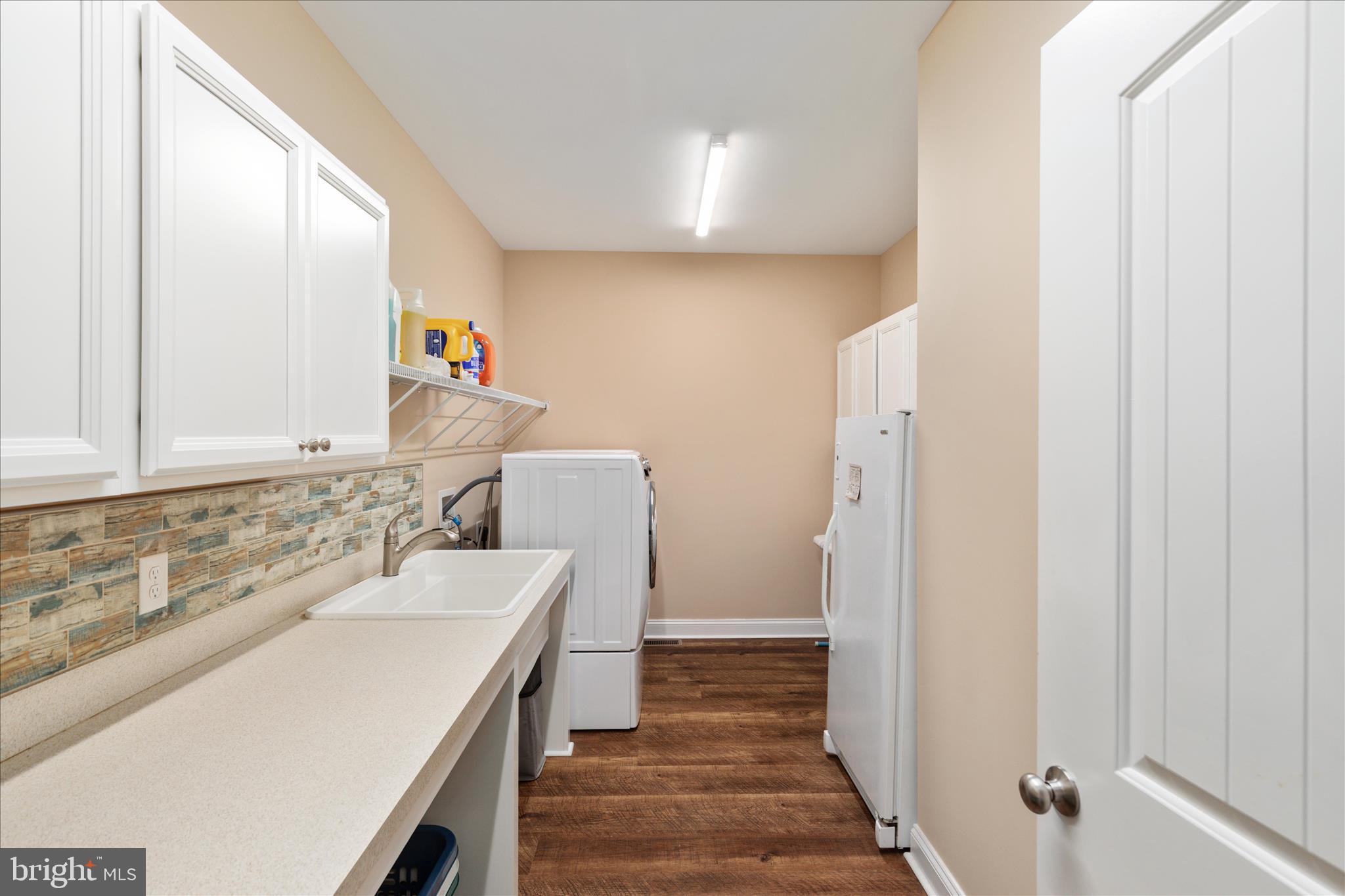 199 Laurel Grove Road Winchester, VA 22602 - Photo 23 of 97 a bathroom with a sink and a mirror
