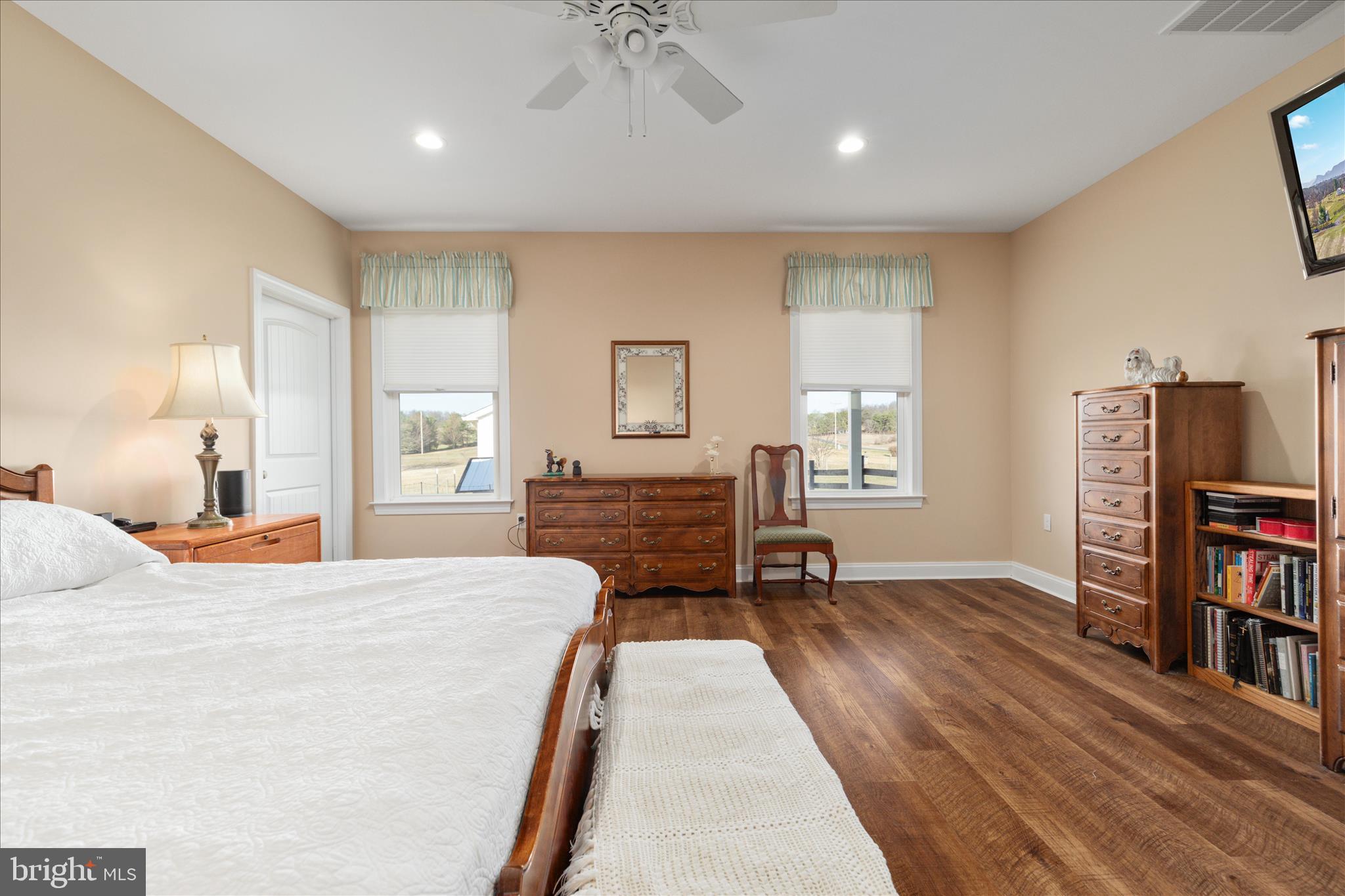 199 Laurel Grove Road Winchester, VA 22602 - Photo 25 of 97 a bedroom with a bed and a book shelf