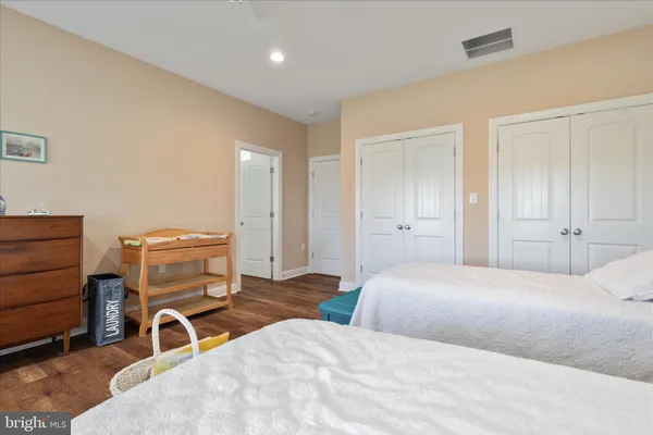 a balcony with table and chairs