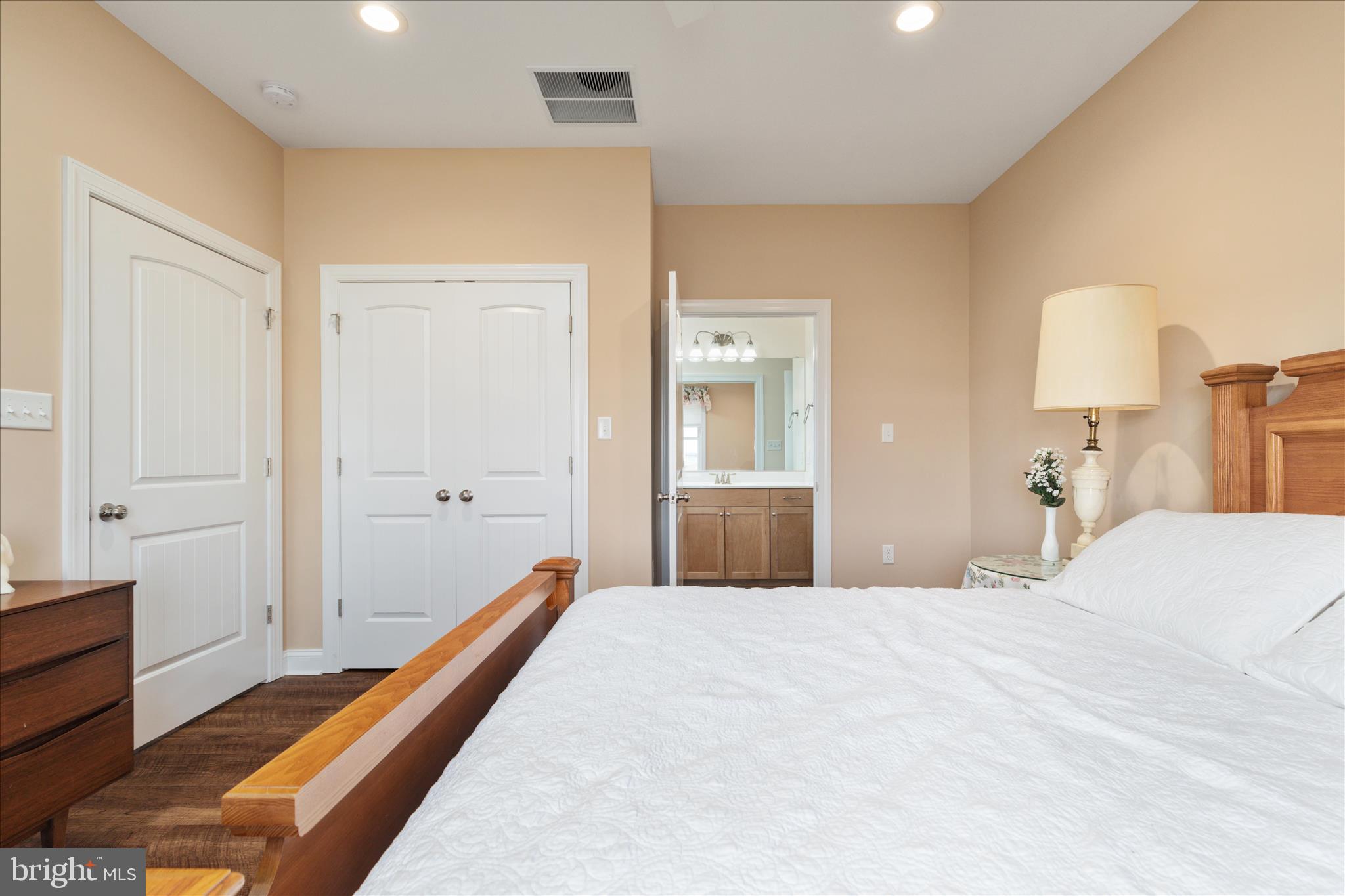 199 Laurel Grove Road Winchester, VA 22602 - Photo 34 of 97 a bed room with a bed and a lamp