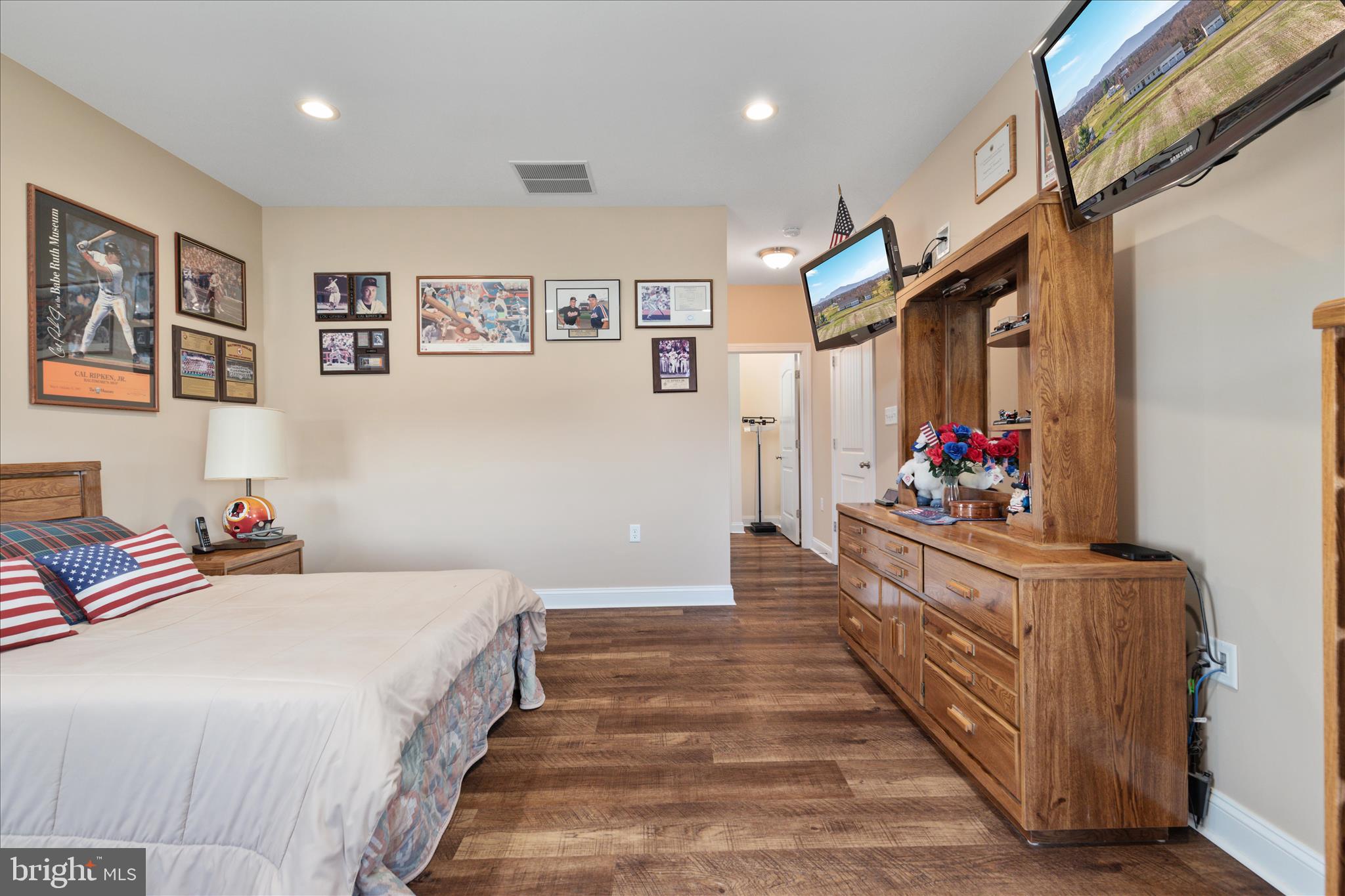199 Laurel Grove Road Winchester, VA 22602 - Photo 37 of 97 a bedroom with bed and a mirror