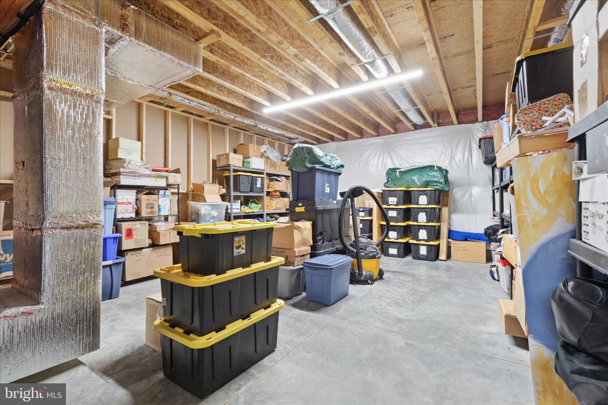 199 Laurel Grove Road Winchester, VA 22602 - Photo 45 of 97 a room with lots of furniture and clutter