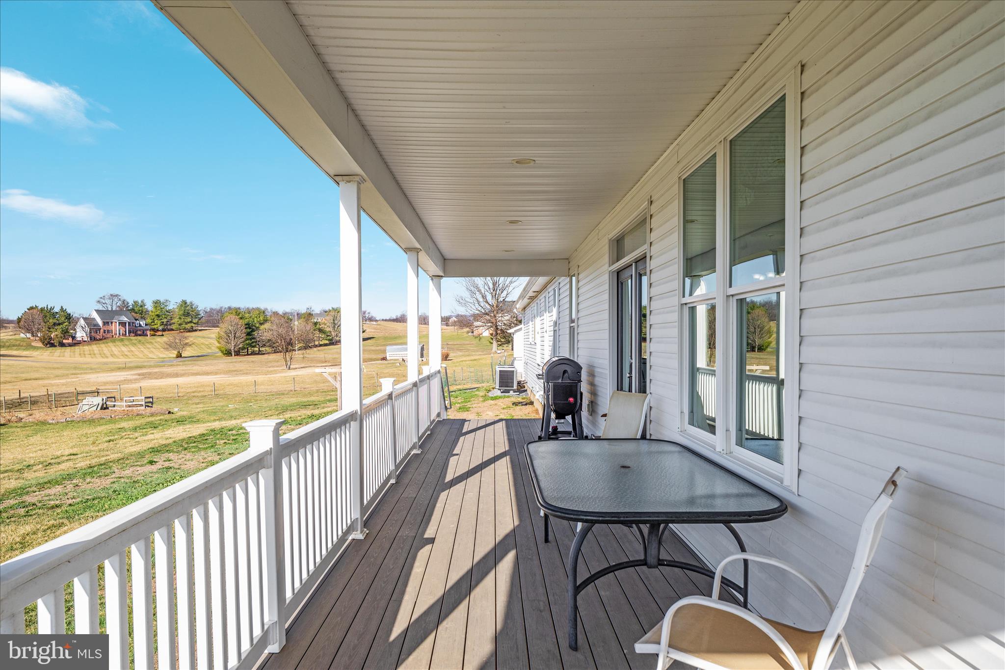 199 Laurel Grove Road Winchester, VA 22602 - Photo 61 of 97 a balcony with table and chairs