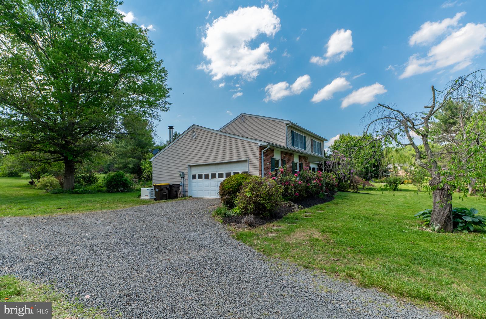 223 Trythall Road Elverson, PA 19520 - Photo 4 of 78 a front view of a house with garden