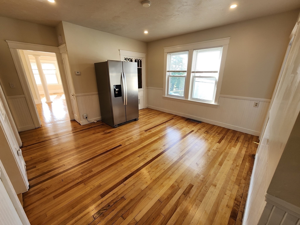 24 Ingleside Avenue Worcester, MA 01604 - Photo 12 of 39 a view of empty room with wooden floor and fan