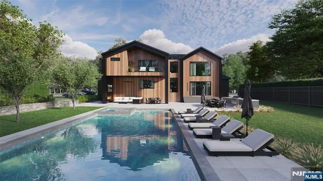 a view of a house with backyard sitting area and garden