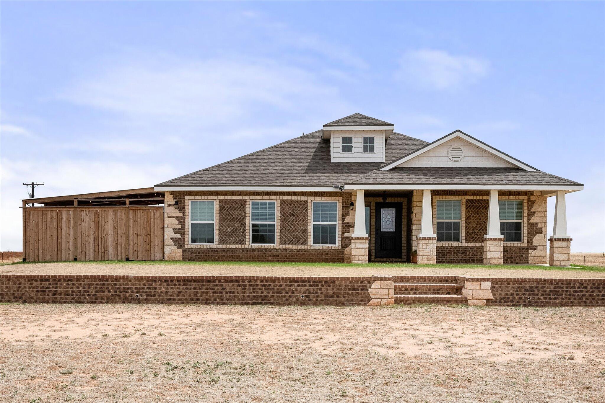 1429 Fm 211 Wilson, TX 79381 - Photo 1 of 43 a front view of a house with a yard