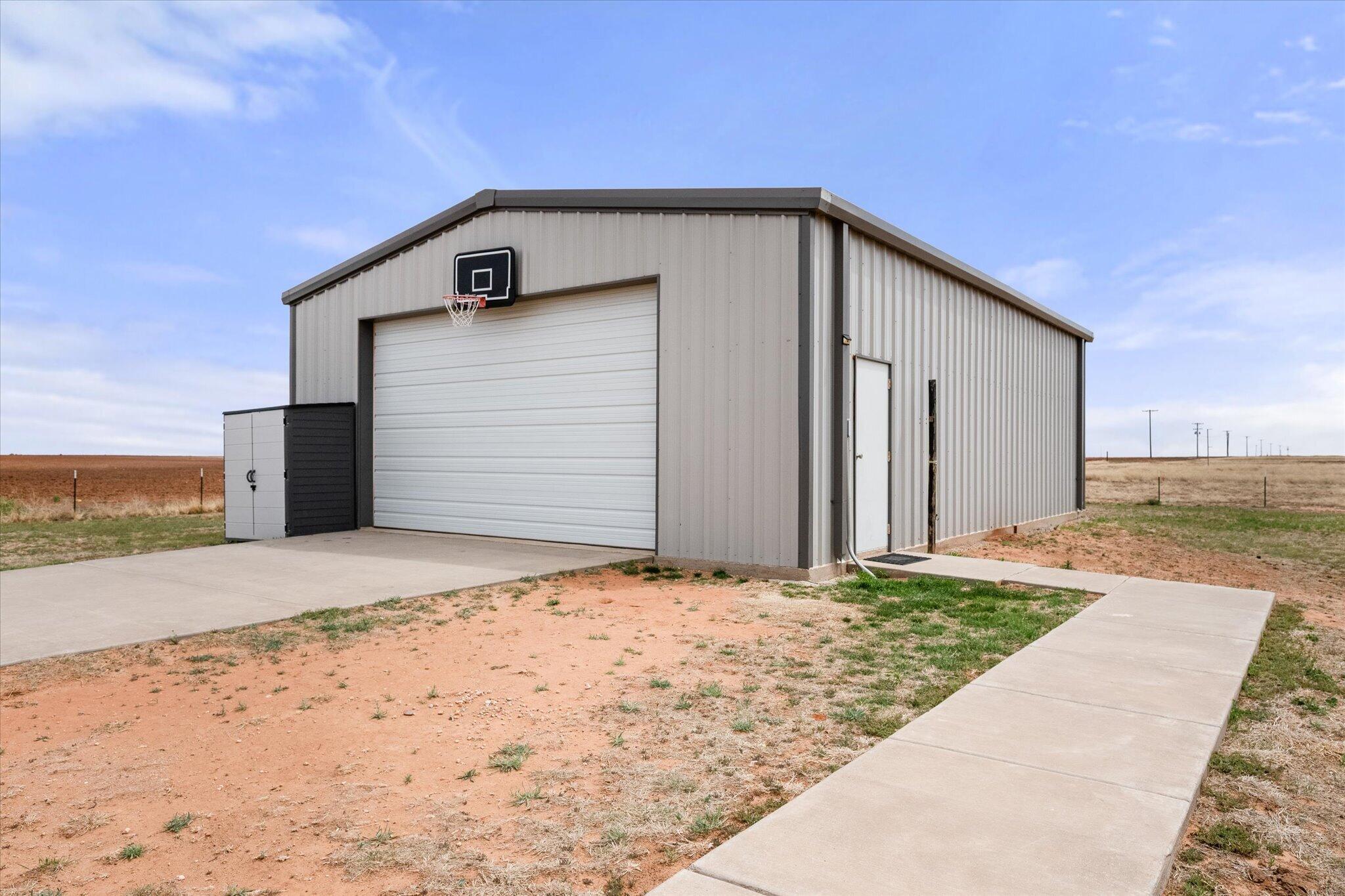 1429 Fm 211 Wilson, TX 79381 - Photo 4 of 43 a front view of a house with a yard