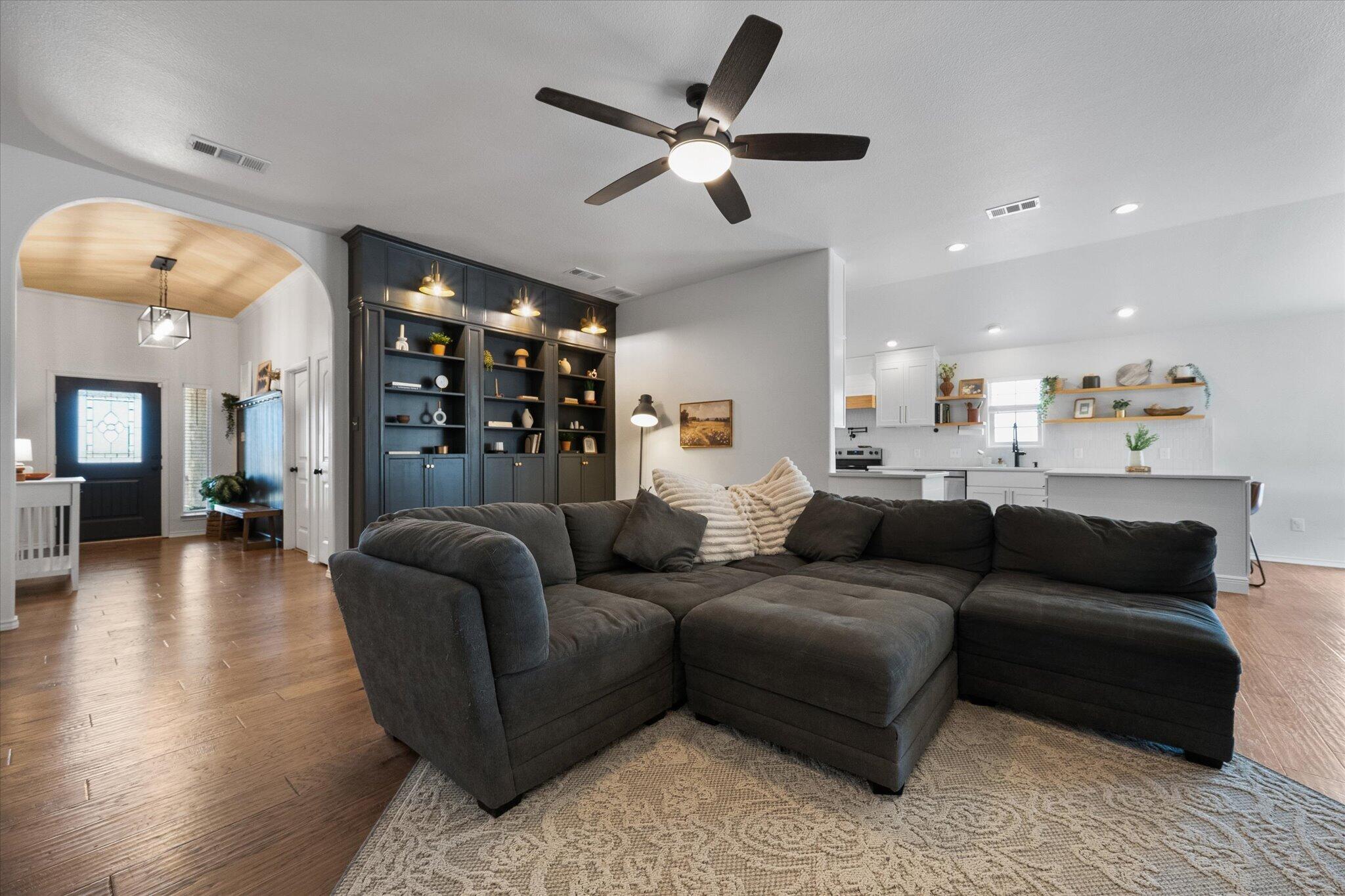 1429 Fm 211 Wilson, TX 79381 - Photo 7 of 43 a living room with furniture and a ceiling fan