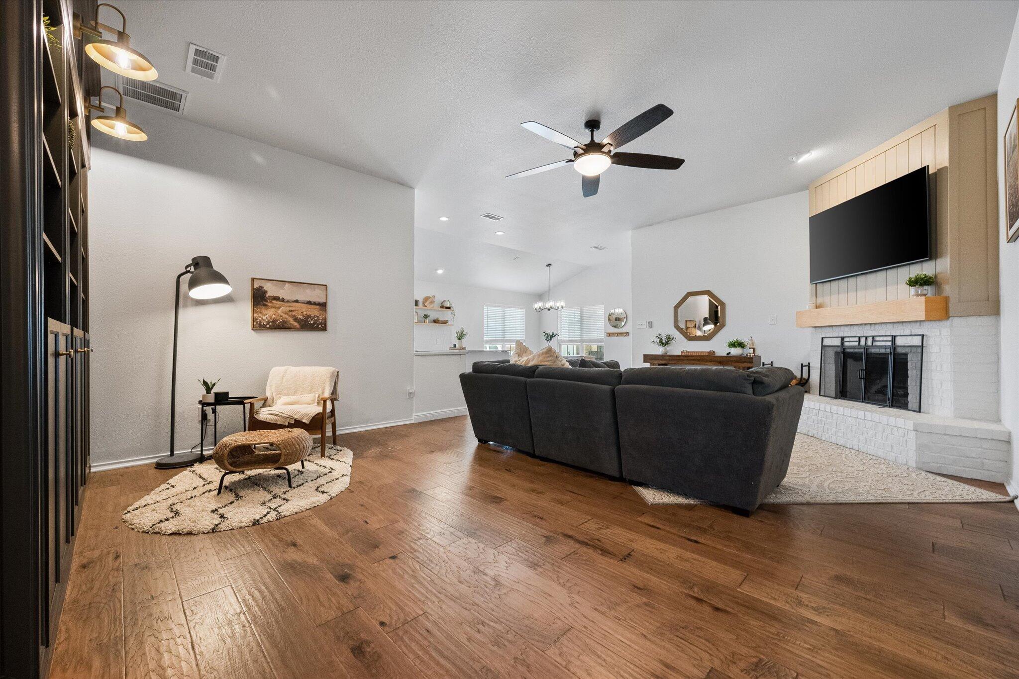 1429 Fm 211 Wilson, TX 79381 - Photo 10 of 43 a living room with furniture and a flat screen tv