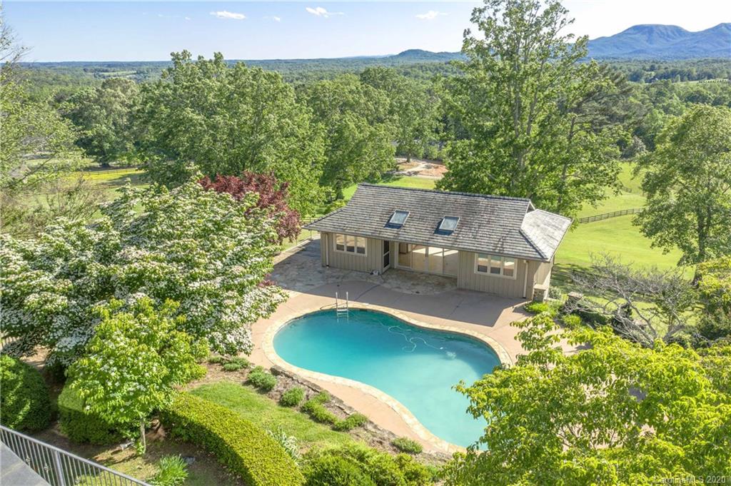 2468 Peniel Road Columbus, NC 28722 - Photo 3 of 47 an aerial view of a house with yard swimming pool and outdoor seating