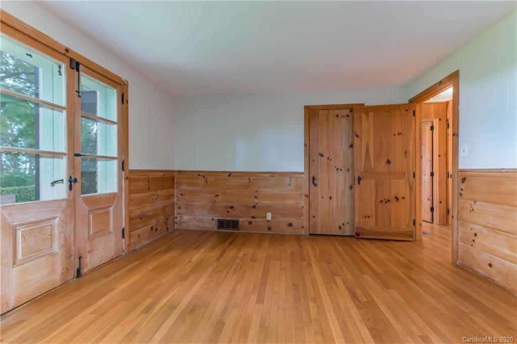 2468 Peniel Road Columbus, NC 28722 - Photo 26 of 47 a view of front door with wooden floor