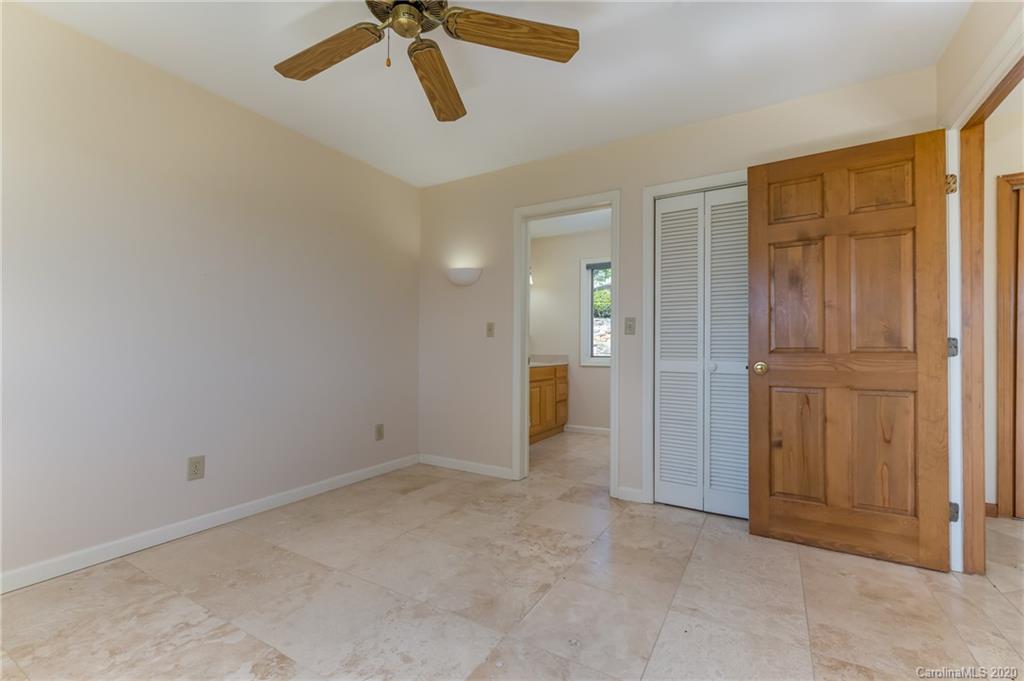 2468 Peniel Road Columbus, NC 28722 - Photo 34 of 47 wooden floor in an empty room