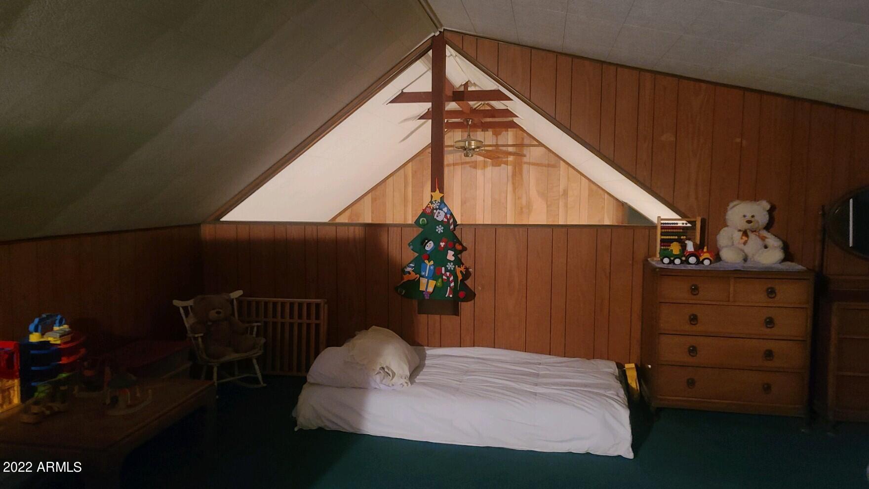 810 East Granite Dells Road Payson, AZ 85541 - Photo 6 of 11 a bed room with a bed and a dresser