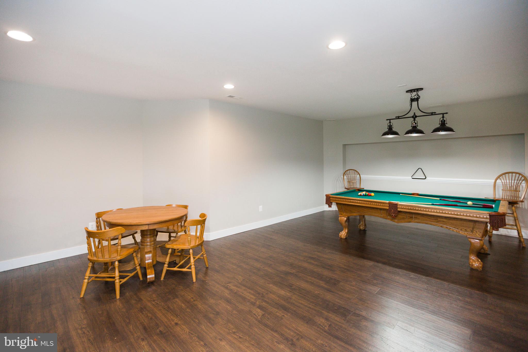 14431 Frederick Road Cooksville, MD 21723 - Photo 55 of 72 Basement eating/gaming area