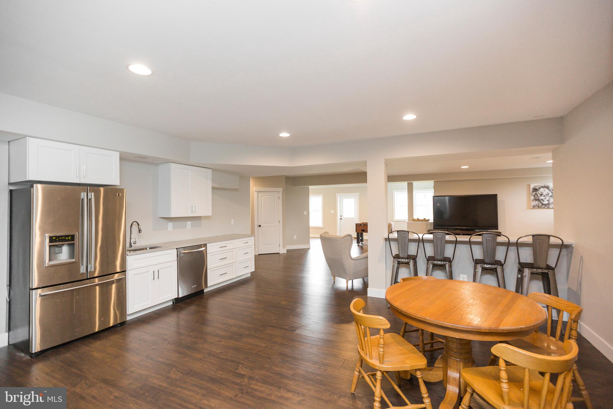 14431 Frederick Road Cooksville, MD 21723 - Photo 56 of 72 Basement eating/gaming area