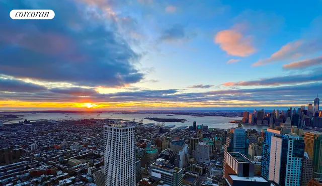 a view of a swimming pool with an outdoor seating