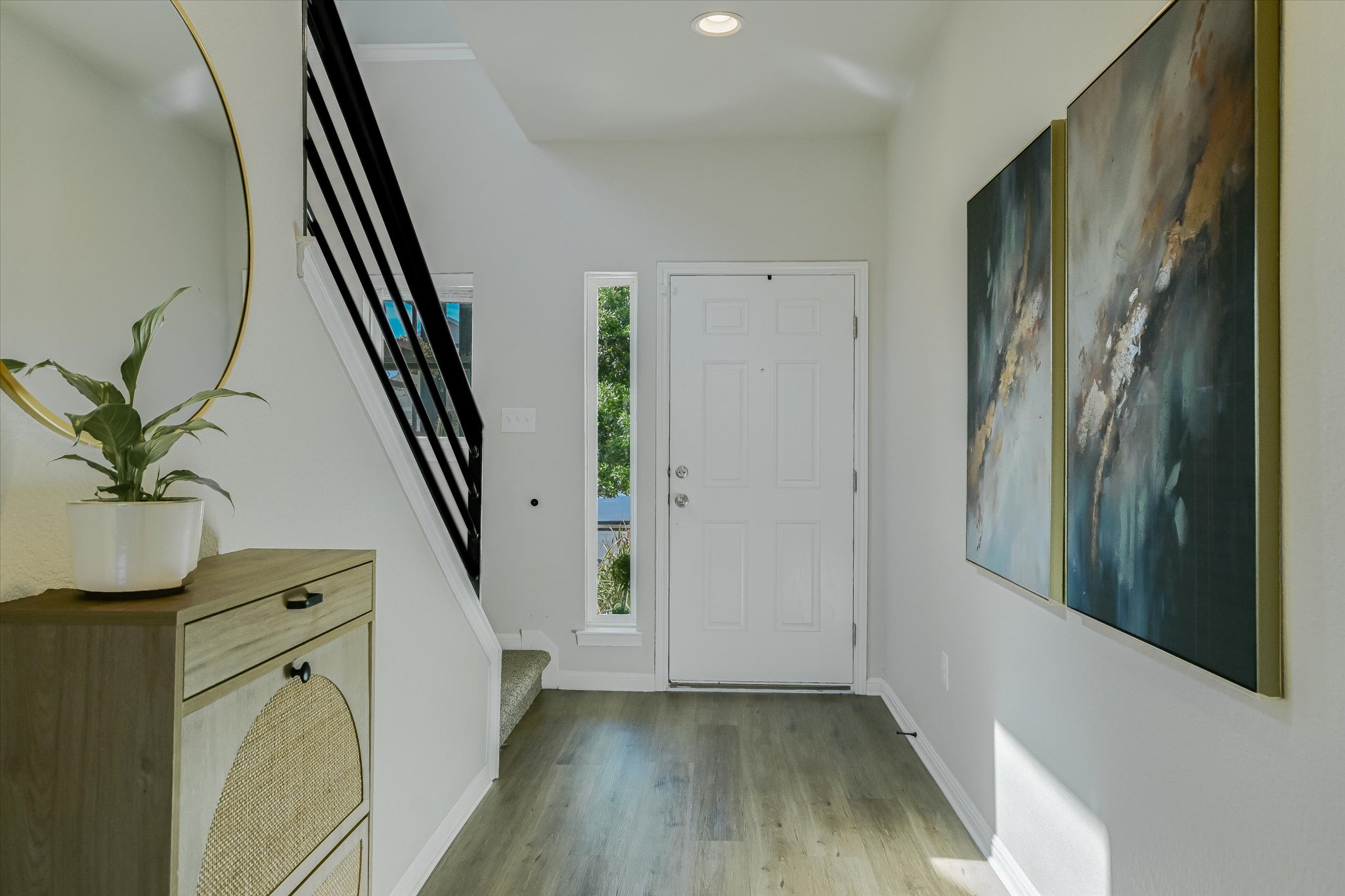 6304 Gunflint Drive Austin, TX 78747 - Photo 4 of 28 Step inside and exhale. This is the kind of entry that sets the tone for everything.