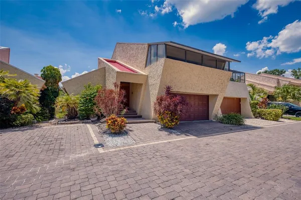 a front view of a house with patio