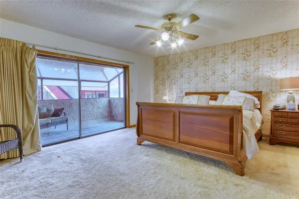 a bathroom with a shower and a bath tub