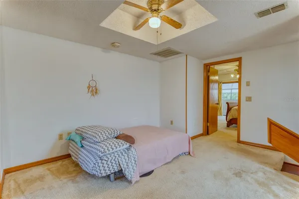 a view of a balcony with wooden floor