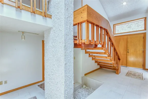 a kitchen with stainless steel appliances granite countertop a stove and a refrigerator