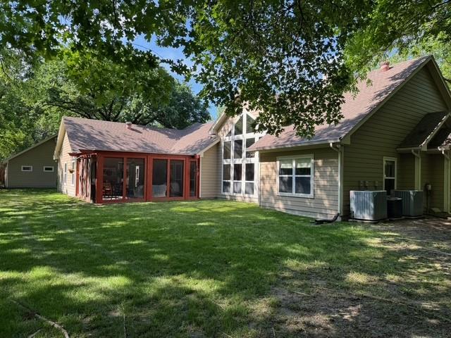 255 Chaparrals Run Azle, TX 76020 - Photo 5 of 35 Back of home and screened in porch