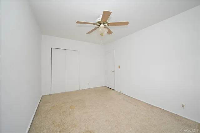 a view of a ceiling fan in a room