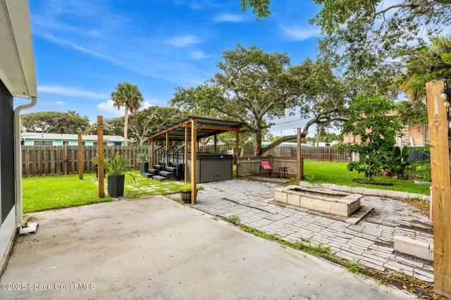a view of backyard with green space