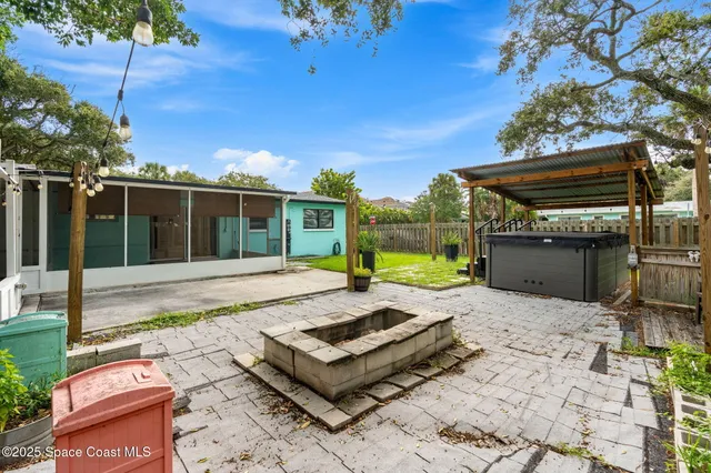 a view of a park with large trees