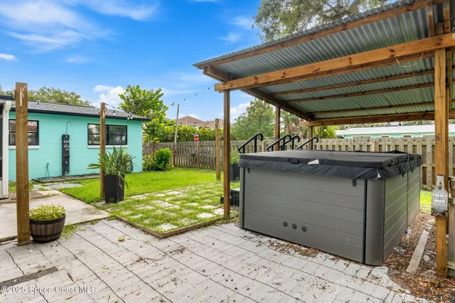 a view of a backyard with a garden