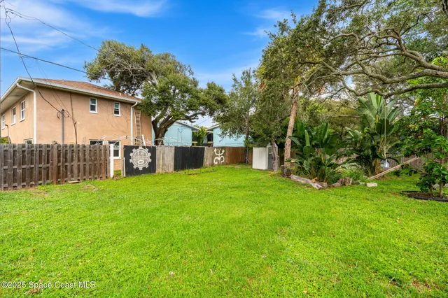 front view of a house with a garden