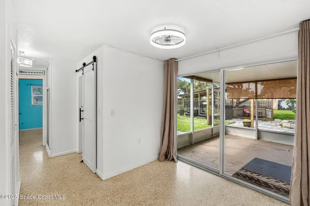 a large kitchen with kitchen island a sink stainless steel appliances and cabinets