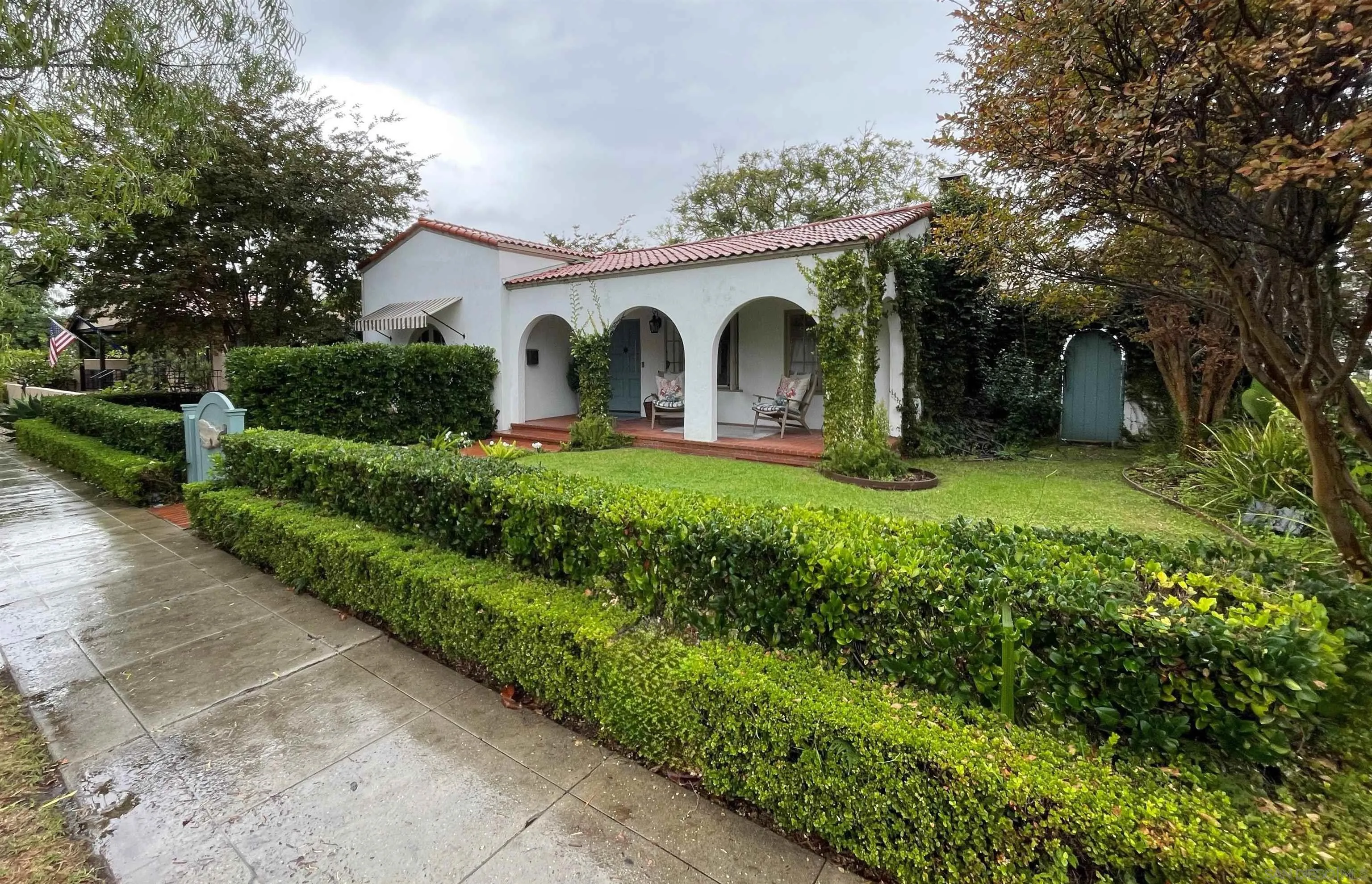 811 10th Street Coronado, CA 92118 - Photo 2 of 7 a view of a yard with plants and large trees