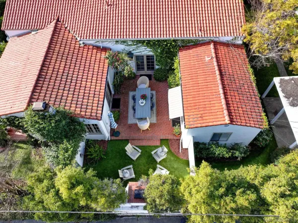 front view of a house with a garden