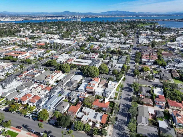 an aerial view of a city with lots of residential buildings