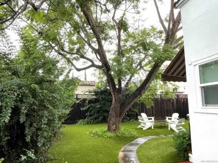 a backyard of a house with seating space