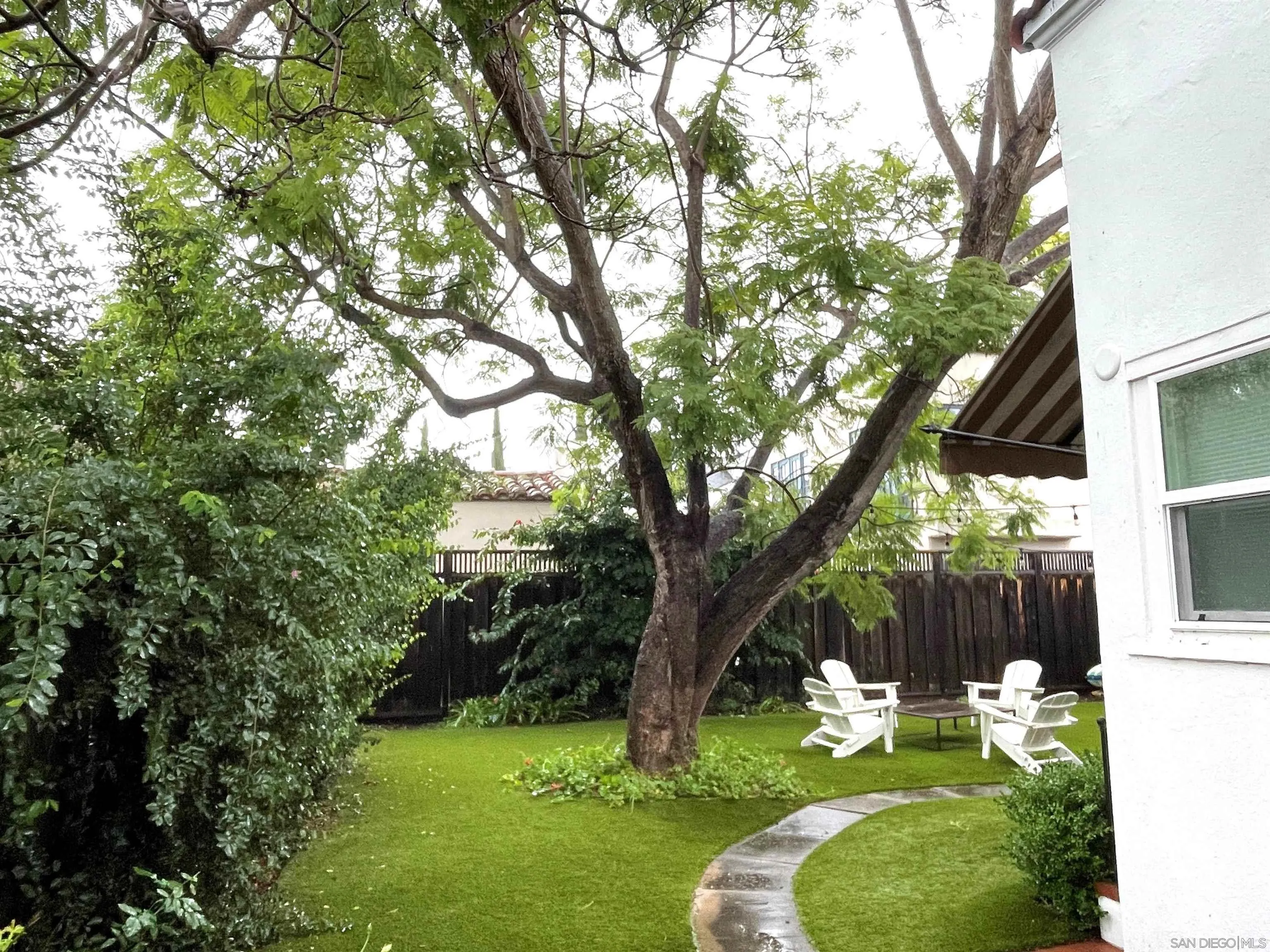 811 10th Street Coronado, CA 92118 - Photo 7 of 7 a backyard of a house with seating space