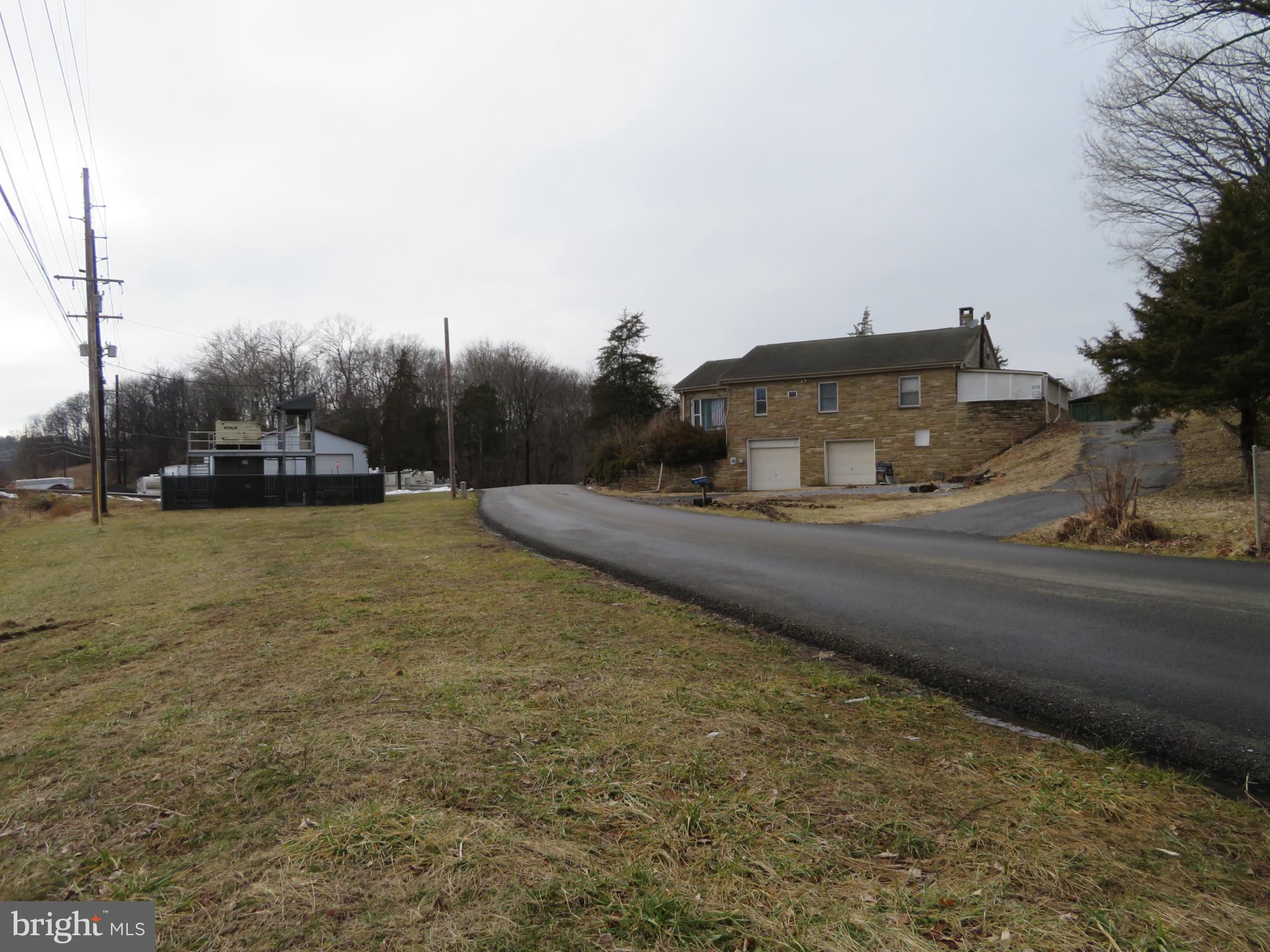 269 Crawford Quarry Road Falling Waters, WV 25419 - Photo 12 of 19 a car parked on the side of the road