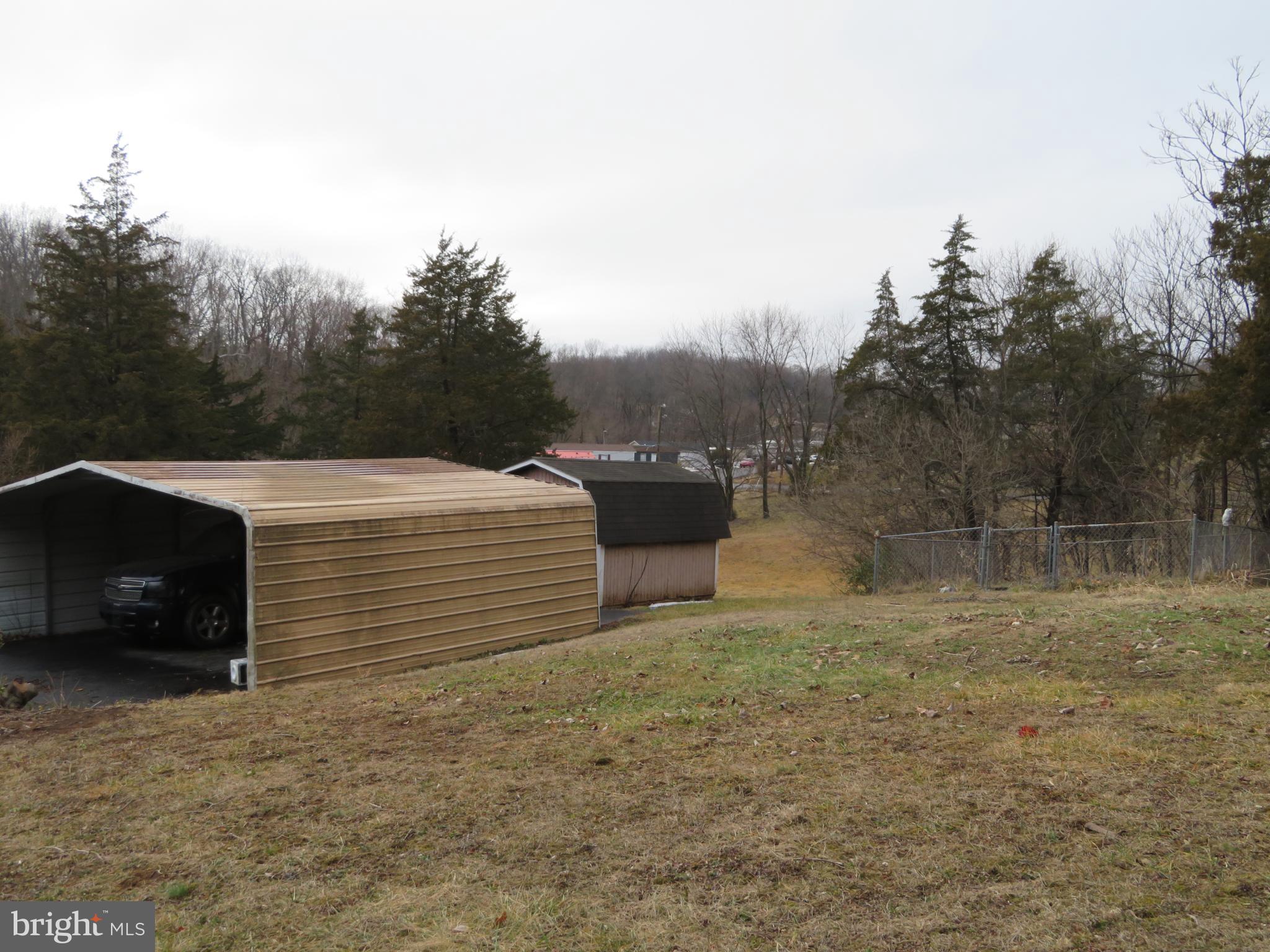 269 Crawford Quarry Road Falling Waters, WV 25419 - Photo 16 of 19 a view of a backyard