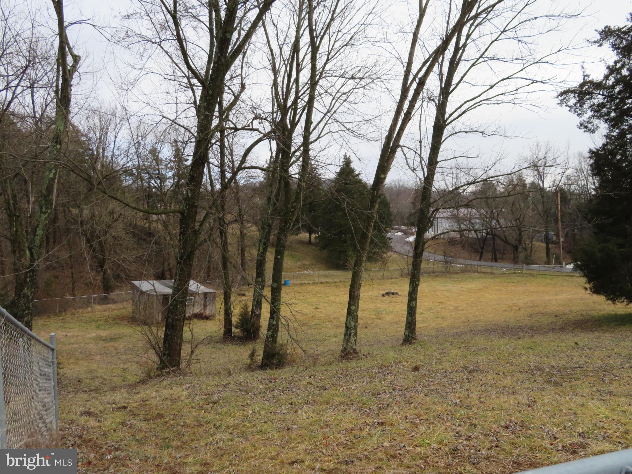 269 Crawford Quarry Road Falling Waters, WV 25419 - Photo 6 of 19 a view of outdoor space with trees