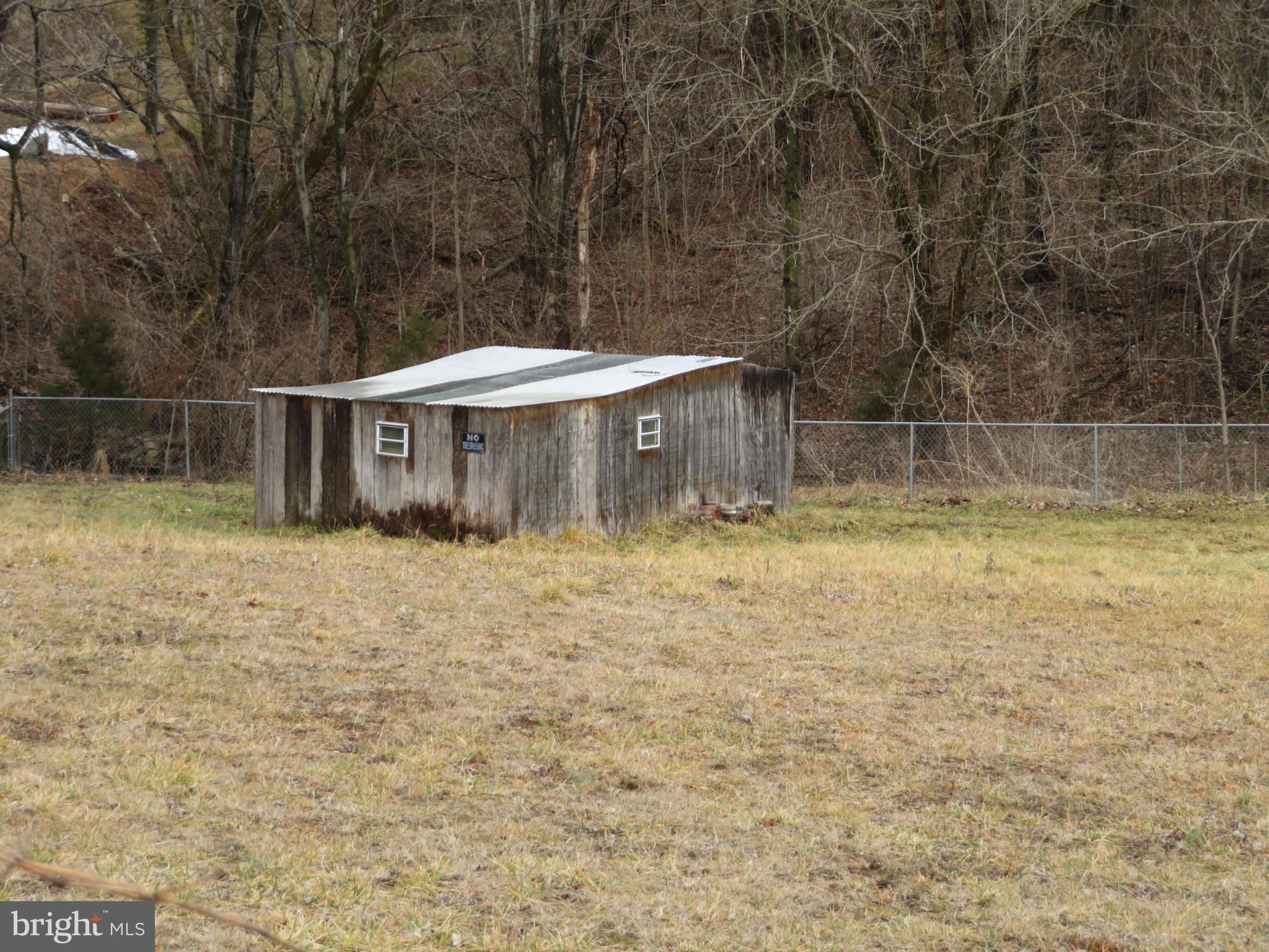 269 Crawford Quarry Road Falling Waters, WV 25419 - Photo 7 of 19 a view of a house with a yard
