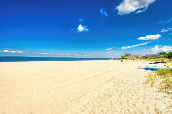 a view of an ocean and a yard