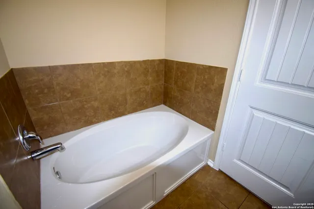 a bathroom with a bathtub