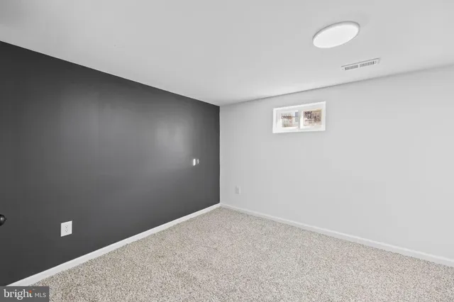 a view of balcony with wooden floor and fence