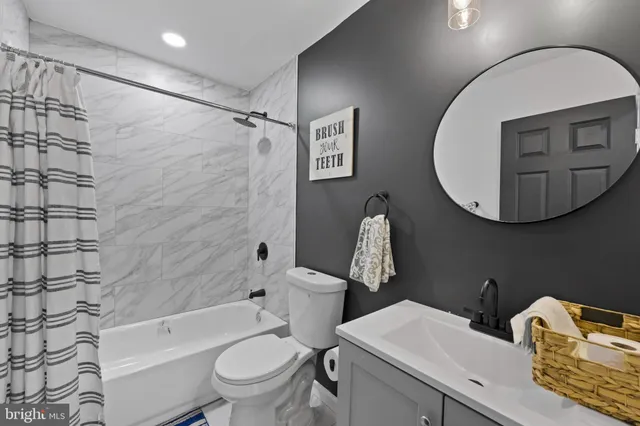 a view of a house with snow on the wall