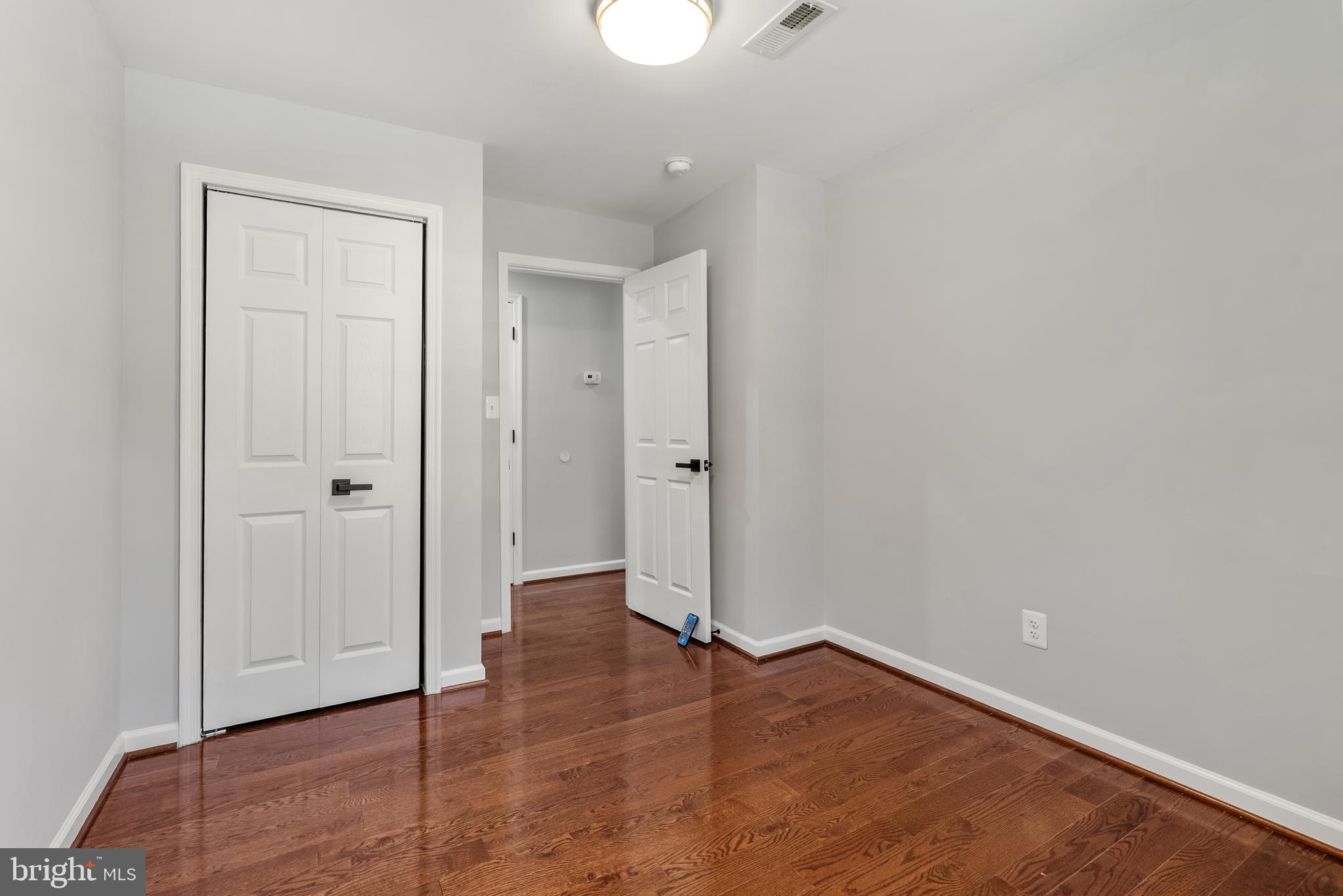 10021 Fox Den Road Ellicott City, MD 21042 - Photo 23 of 41 wooden floor in an empty room