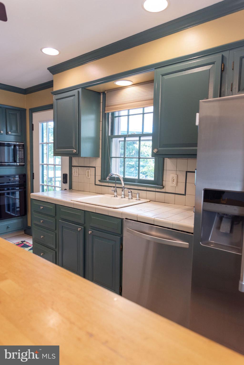 1609 Walton Road Blue Bell, PA 19422 - Photo 14 of 64 a kitchen with stainless steel appliances granite countertop a sink and a microwave