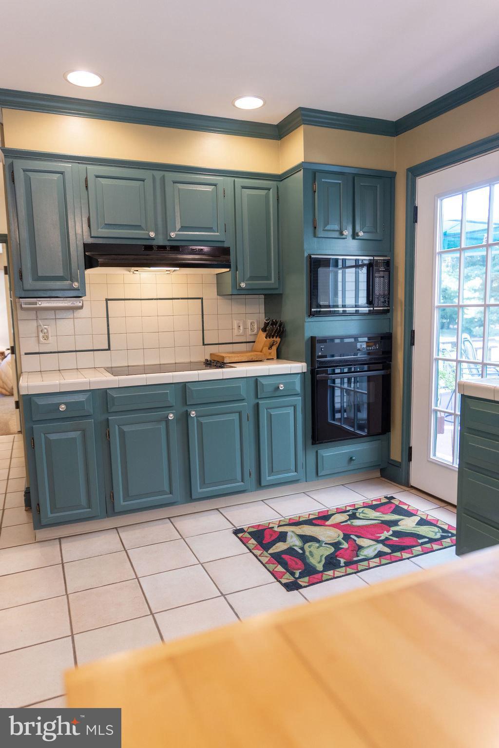 1609 Walton Road Blue Bell, PA 19422 - Photo 15 of 64 a kitchen with stainless steel appliances granite countertop a sink stove and cabinets