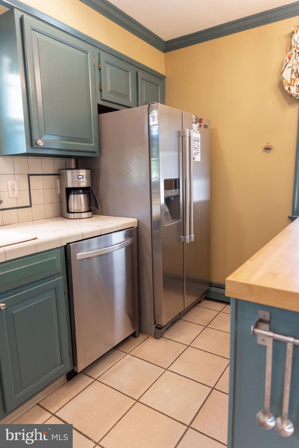 1609 Walton Road Blue Bell, PA 19422 - Photo 18 of 64 a kitchen with metallic refrigerator and washer